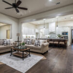 Hardwood flooring and fairly high ceilings give a formal feel in this sitting room