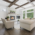 Family room with a wall full of windows