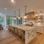 New kitchen with natural wood and white colors
