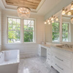 Gorgeous master bathroom with wood tray ceiling